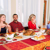 Cory Chase and Sydney Cole share a meat pole on Thanksgiving