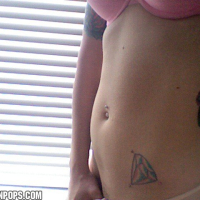 Blonde Lynn Pops shows off her Tatoos in various Pics