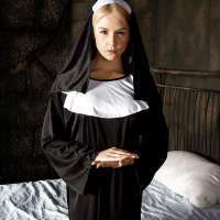 Blonde babe Sara Sloane strips off nuns uniform to expose big tits