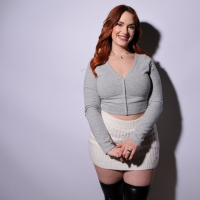 Busty redhead Siri Dahl moans from pleasure while masturbating
