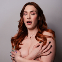 Busty redhead Siri Dahl moans from pleasure while masturbating