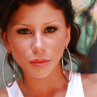 Brunette model Brooklyn Lee flashing nice underboobage in white Tshirt