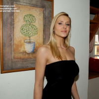 Jane Darling shows big Boobs wearing black Dress