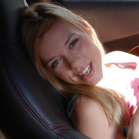 Cute blonde babe Nicole Ray masturbating her wet cunt in the car