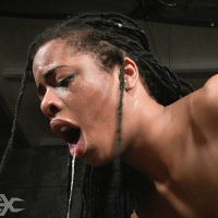 Kira Noir is bound in leather straps and double fucked by maledo