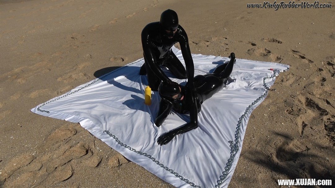 Kinky Latex Lara gets talked into jerking off a dick on the beach - Photo #1584935