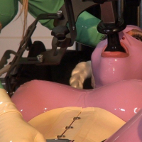 Horny Latex Lara getting pleased with toys by two friends