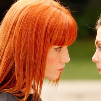 Adorable lesbian Kiera Winters making out with her friend outdoor