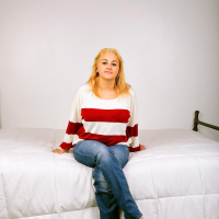 Curvy blonde coed Aria Skye strips for you in bed