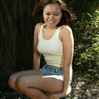 Annie Cruz is tied and gagged to a tree as she pleases two men