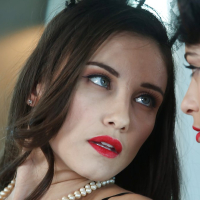 Lesbian pornstars Celeste Star and Raven Rockette toy twats and eat ass