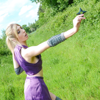 Kinky blonde babe Jessica Jensen playing around in a ninja outfit