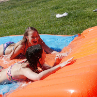 Lesbian chicks with tiny tits get dripping wet in outdoor sex games