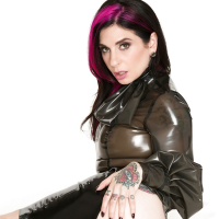 Fetish model Joanna Angel modeling assless latex miniskirt in high heels