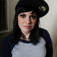 Dexey Paige shows off her delicious little ass as she pulls down her tight jeans