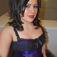 Plump teen posing in beautiful blue lingerie