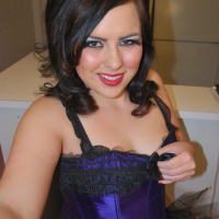 Plump teen posing in beautiful blue lingerie