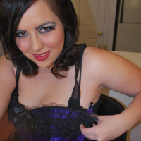 Plump teen posing in beautiful blue lingerie