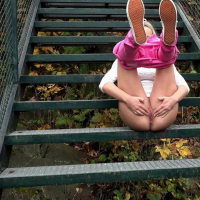 Amy Pink in tight pink pants taking a leak