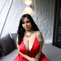 Gorgeous latin babe Kim Velez in red nighties flashing her big guns