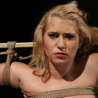 Cute blonde Linda Ray taking off her lingerie and getting bound