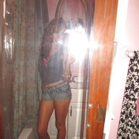 Gorgeous Latina Ella Milano is doing some self shots in close up