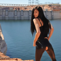 Zoe Rush posing Outdoors in her crotchless latex Pants