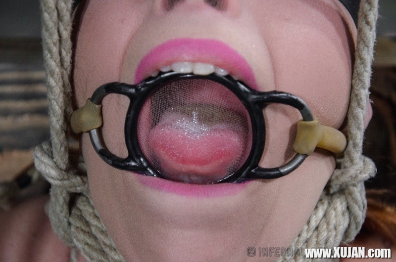 Bella Rossi is bound in wood with mouth spreader with clamps on her big tits - Photo #1655237