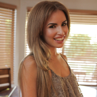 Awesome teen Natasha White is smiling and playing with her pussy