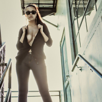 Gorgeous Elizabeth Marxs showing her big tits on the stairs