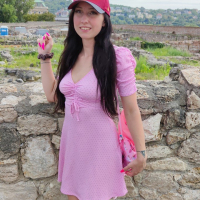Bella Angel drops her pink dress then spread her legs wide open