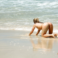 Hot blonde first timer Ashley Fires spreading long legs outdoors in ocean