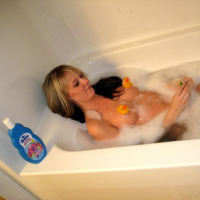 Pictures of teen babe GND Cali taking a hot bath