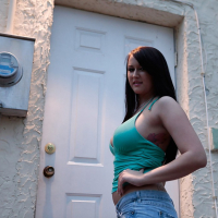 Saucy babe with nice ass Alexis Grace revealing her big tits outdoor