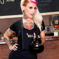 Jessie Lee shows her nice tattooed body