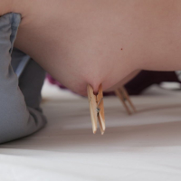 Kinky Ginger Mary plays with laundry pegs