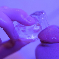 Horny babe Ginger Mary enjoys playing with ice cubes in hot bath tub