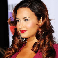 Demi Lovato exposing sexy body and huge cleavage in nice red dress