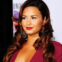 Demi Lovato exposing sexy body and huge cleavage in nice red dress