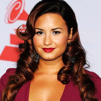 Demi Lovato exposing sexy body and huge cleavage in nice red dress