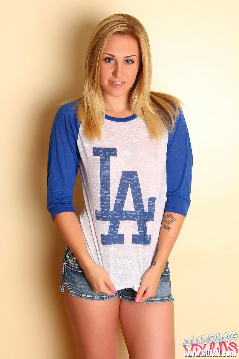 Ashley Vallone shows off her round little ass in tight jean shorts - Photo #1686783