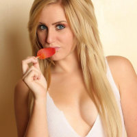 Sexy girl Ashley Vallone sucks on a popsicle in her long socks
