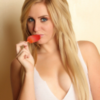 Cute teen sucks lollipop