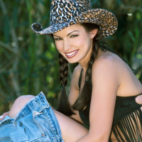 Sexy Cowgirl Aria Giovanni stripping outside