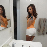 Katie Jordan takes some selfies before hopping on a cock