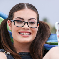 Kinky Veronica Valentine in braces mounts a dong