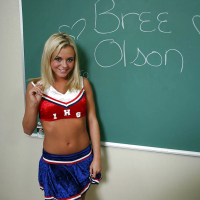 Nasty cheerleader Bree Olson revealing her big tits and shaved cunt