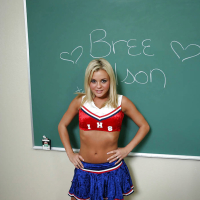 Nasty cheerleader Bree Olson revealing her big tits and shaved cunt