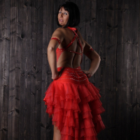 Solo hottie Desyra Noir teasing with her body in red dress
