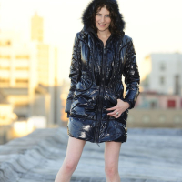 Sabrina Deep takes off her long Coat and poses naked
